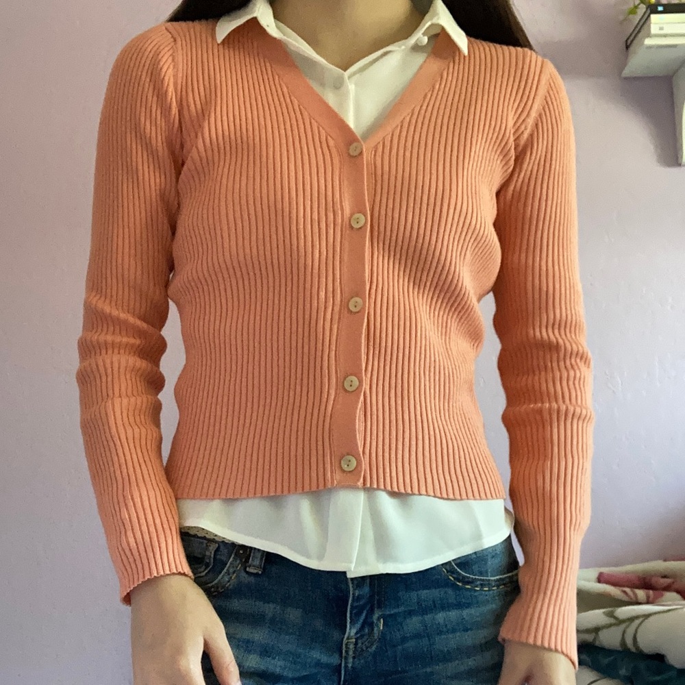 Peach colored button up cardigan